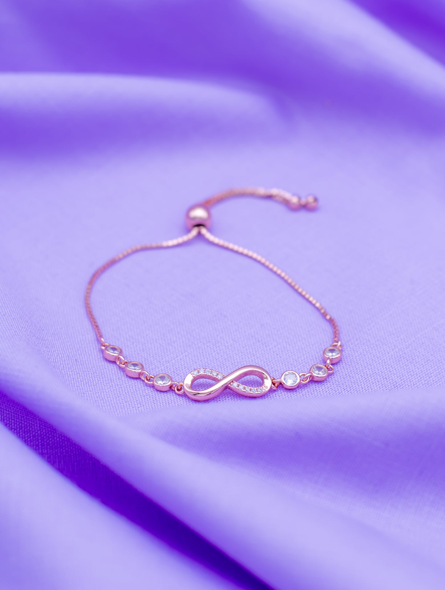 Sterling Silver Infinity Bracelet with Rose Gold Polish